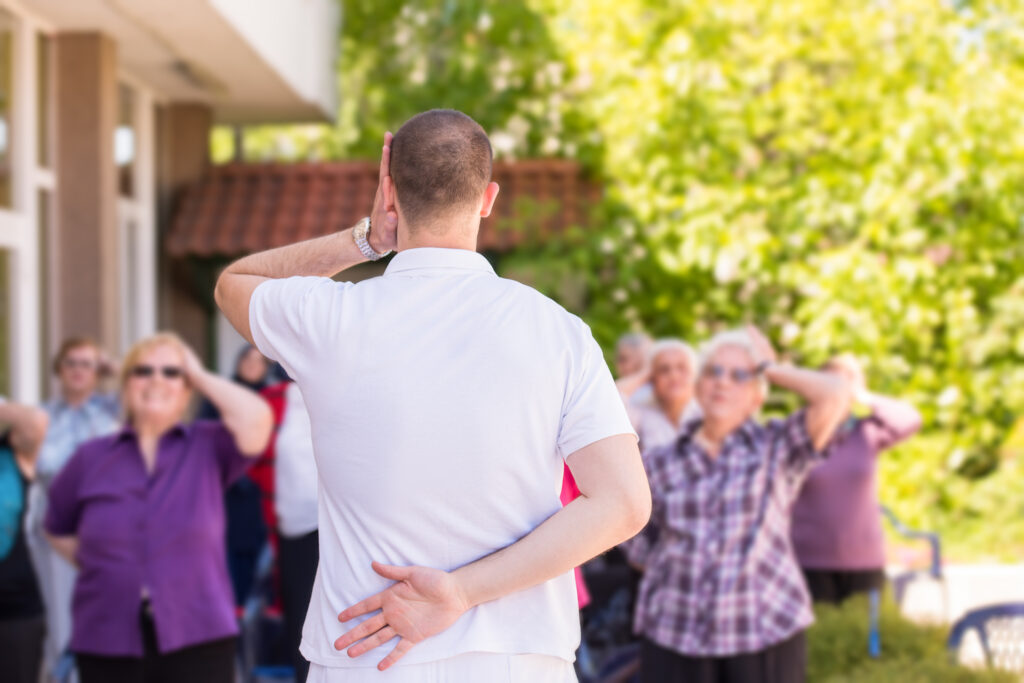 trainer training motivated active healthy senior people